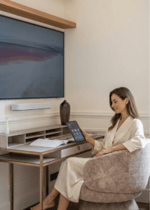 Productive office space, hidden cables, discrete entertainment system using Samsung the Frame TV in a luxury apartment integrated by Hi-Concept.