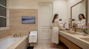 Luxury-Smart-Home-Bathroom-Paris-Haussmann-Apt-Hi-Concept Luxury Smart Home bathroom with Samsung the Frame TV, elegant switches and mood lighting changes integrated by Hi-Concept